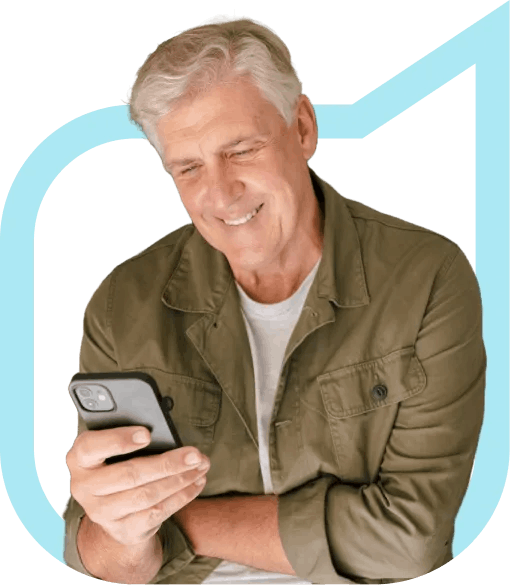 Smiling man on phone looking at pathology results